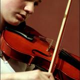 Detroit Waldorf School Photo - Students in grades 3 begin playing the violin. In grade 5, additional string and wind instruments are added.