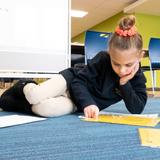 Marburn Academy Photo - A Lower Division student works on a project in the common area.