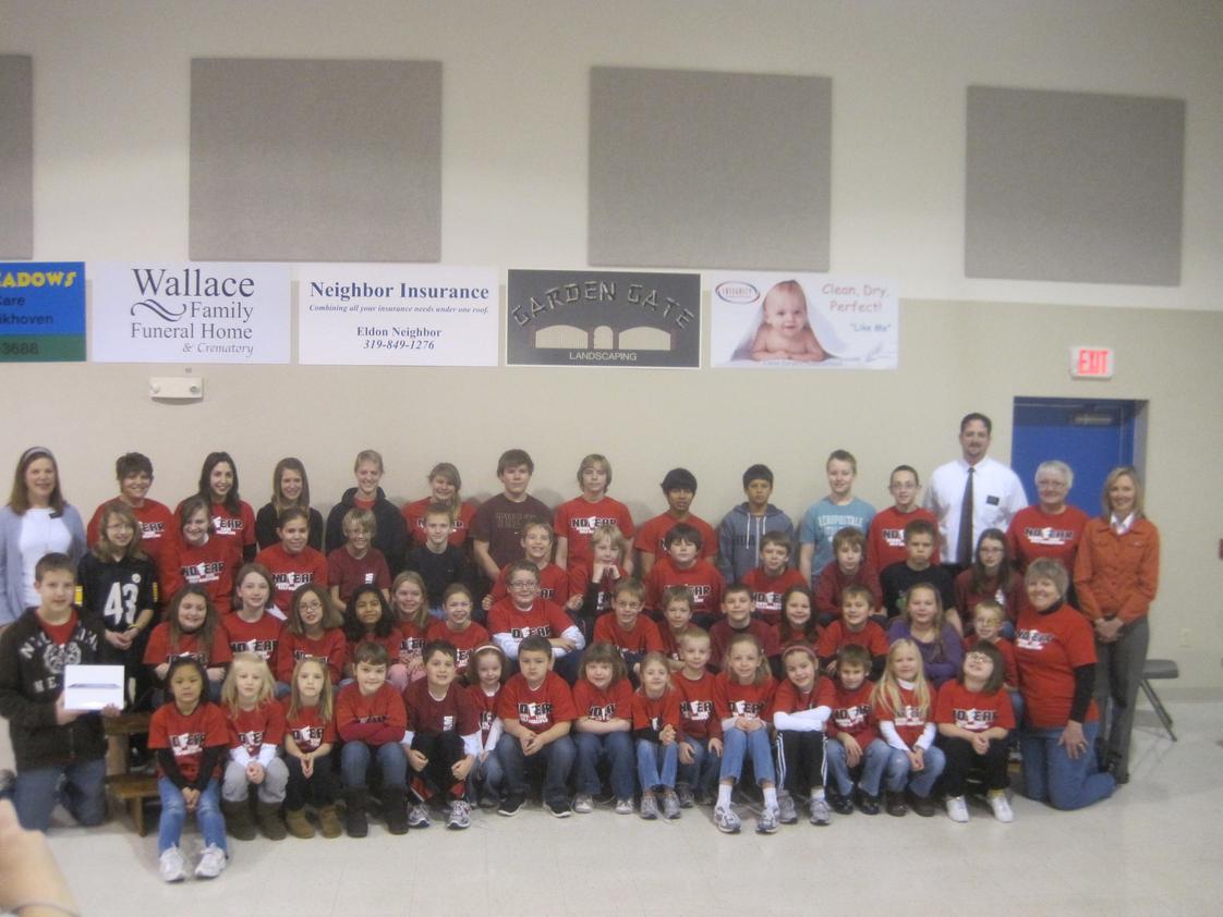 Newton Christian School Photo - Newton Christian students and staff receive a Smartboard from Newton's Hy-Vee.